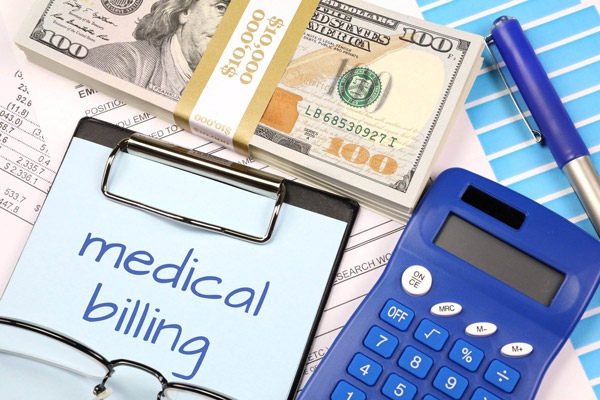 medical billing text written on a clipboard